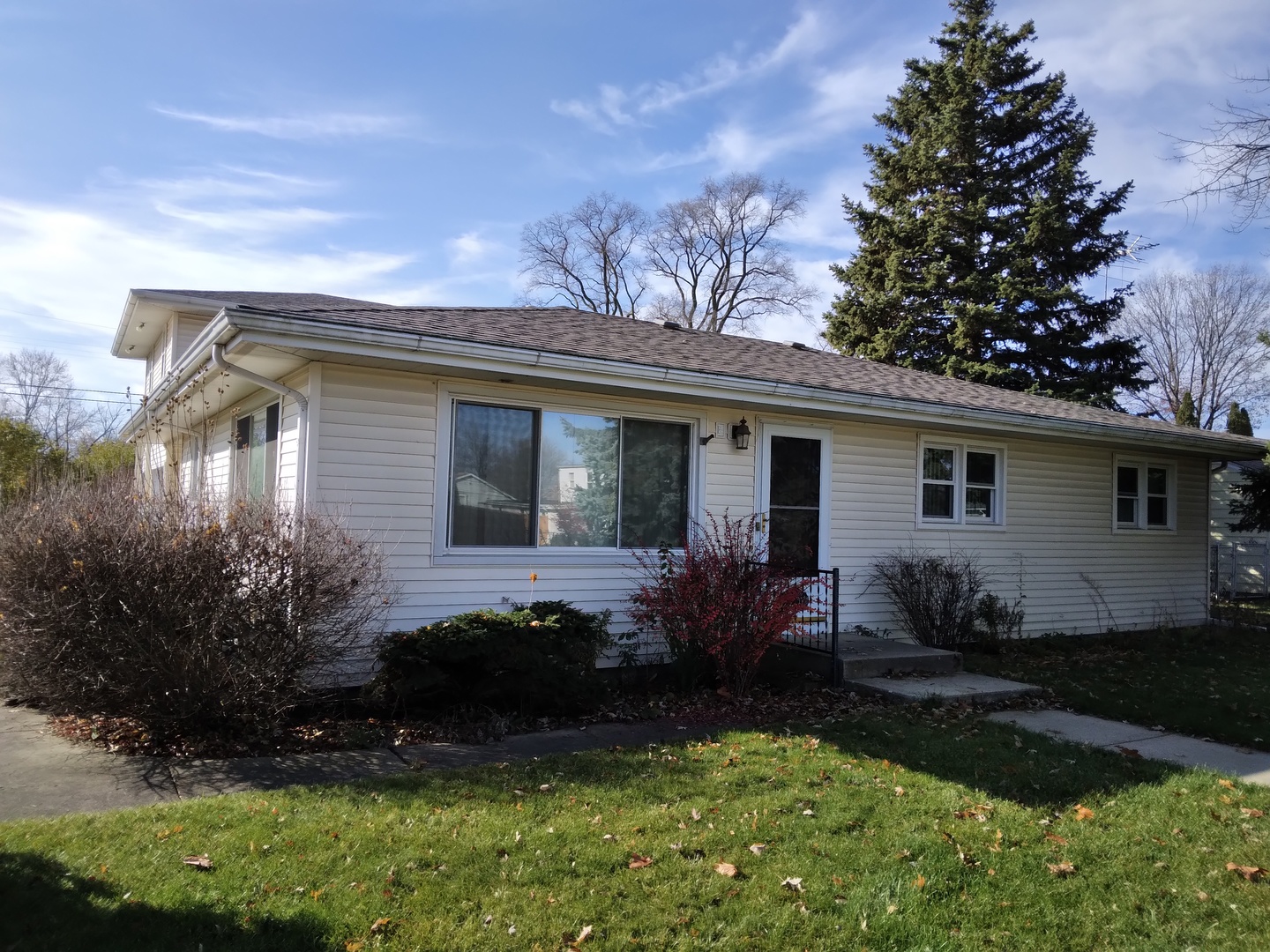 2201 Root Street Crest Hill, IL 60403 - Photo 3 of 27 a house that has a lot of plants and trees in it