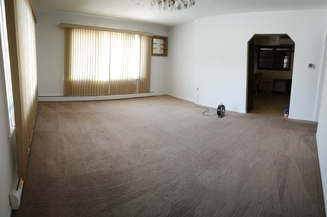 2201 Root Street Crest Hill, IL 60403 - Photo 4 of 27 an empty room with windows and closet