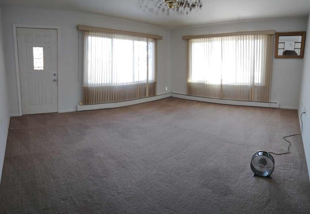 2201 Root Street Crest Hill, IL 60403 - Photo 5 of 27 an empty room with windows