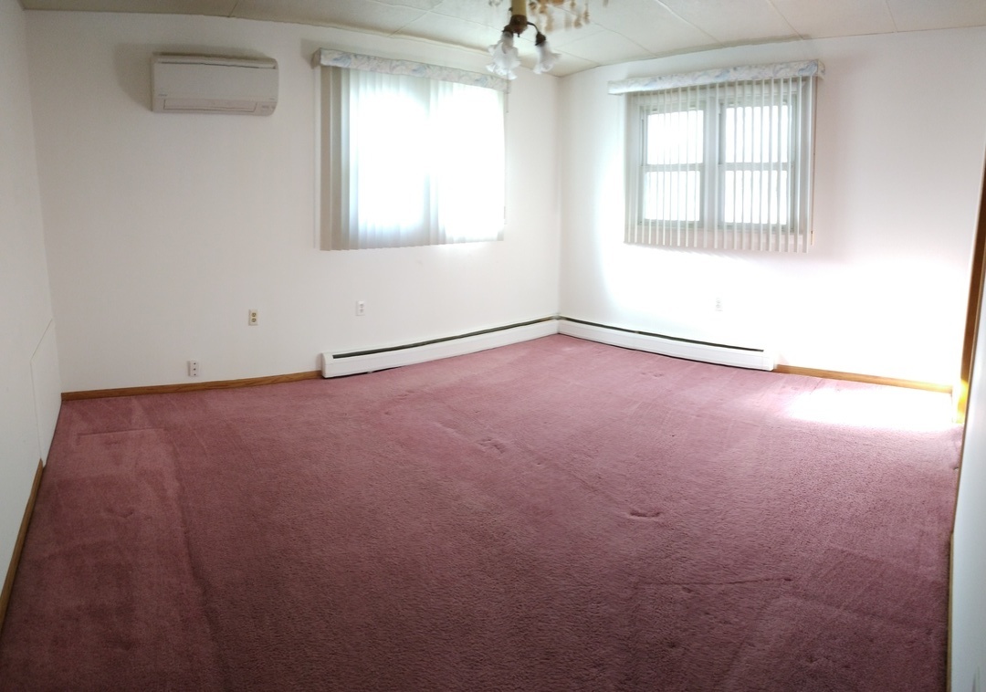 2201 Root Street Crest Hill, IL 60403 - Photo 9 of 27 an empty room with a window