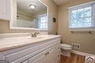 a bathroom with a sink and a toilet