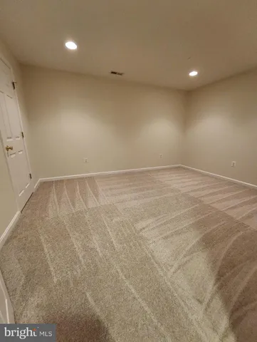 an empty room with an entryway
