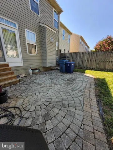 a view of a swimming pool with a yard