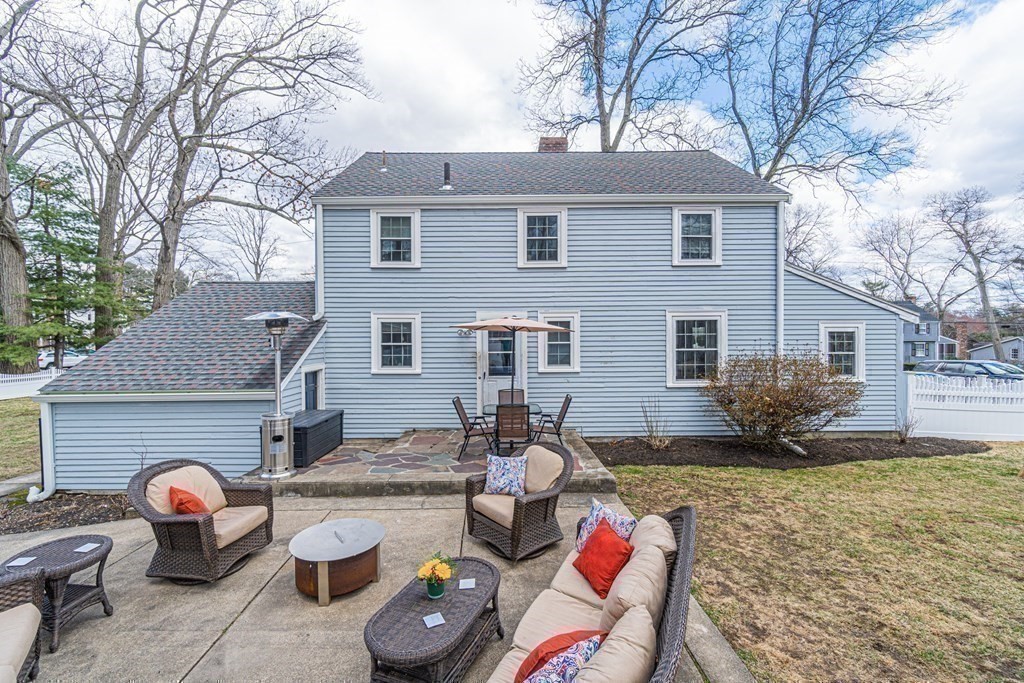 71 Pine Ridge Road Reading, MA 01867 - Photo 31 of 40 a view of a house with a patio