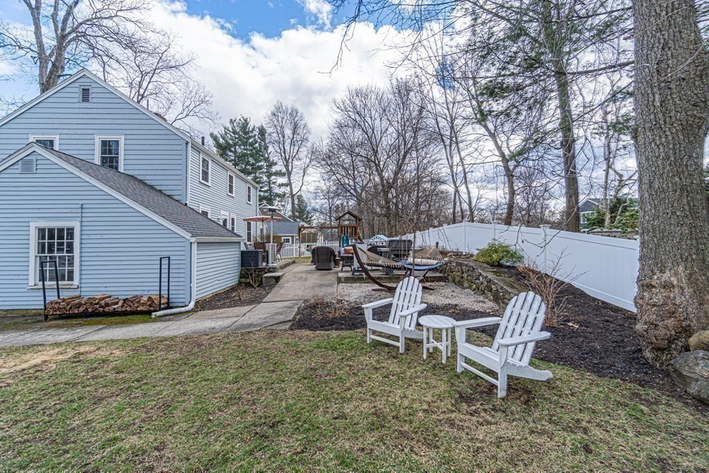 71 Pine Ridge Road Reading, MA 01867 - Photo 35 of 40 a view of a backyard with sitting area