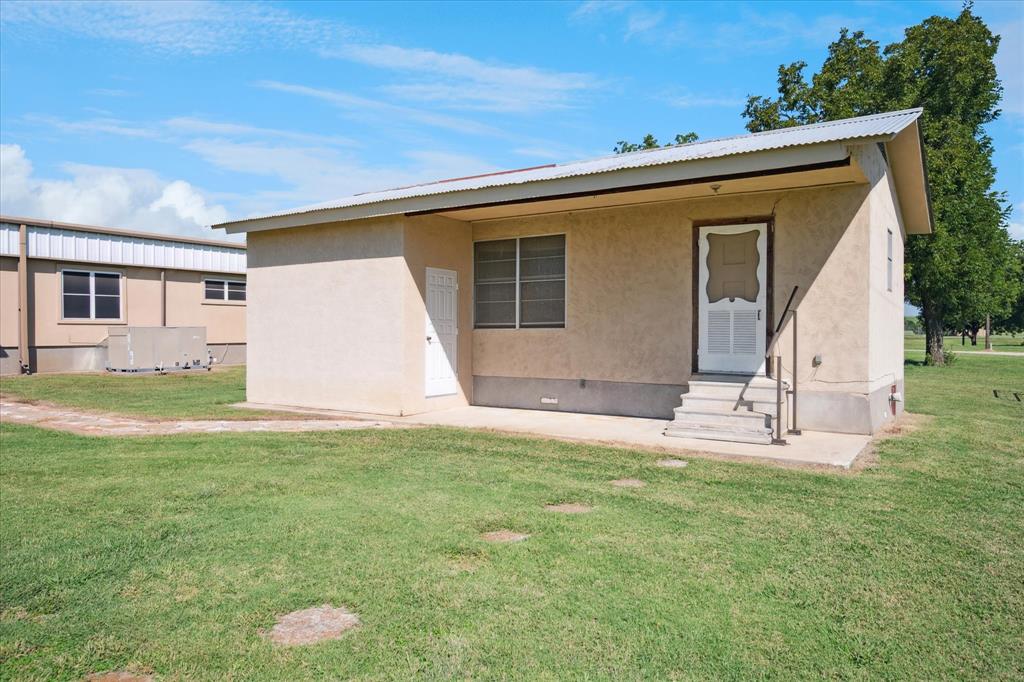 6941 Burger Road Aubrey, TX 76227 - Photo 16 of 28 Tiny Home w/Kitchen and full bath. Great opportunity for Guest Quarters,Office or She Shed.