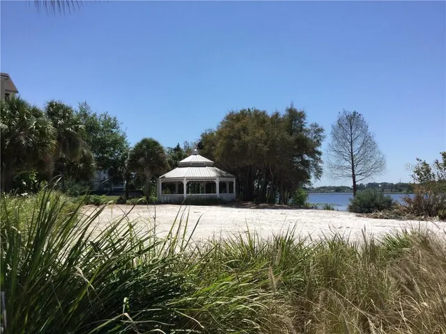 a view of large pool and a yard