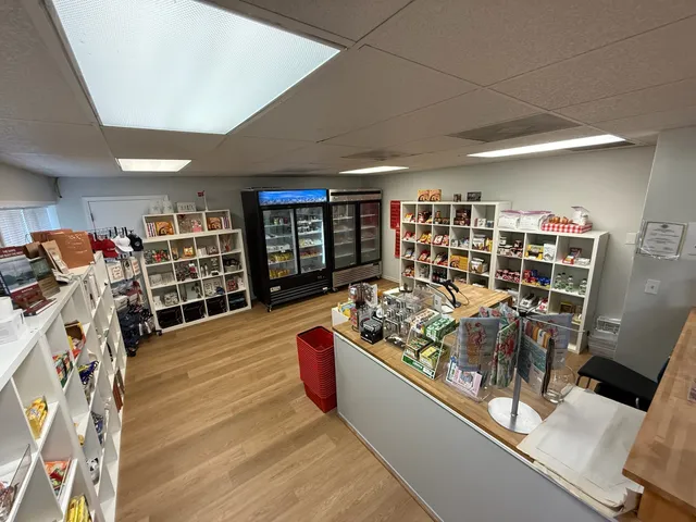 a room with wooden floor and furniture