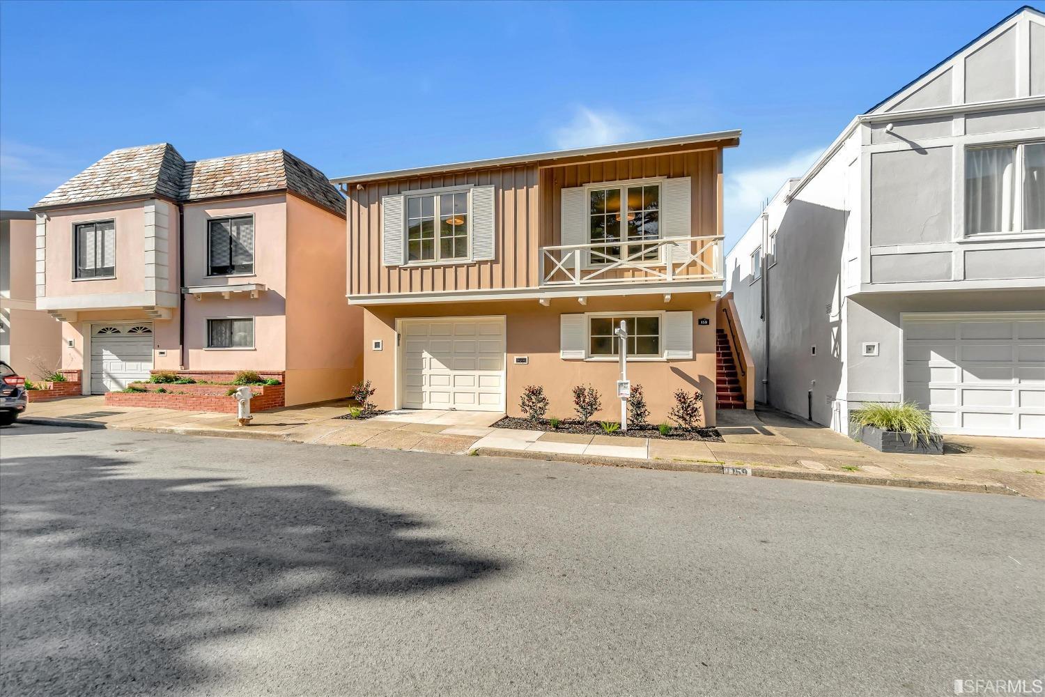 a front view of a building with a street