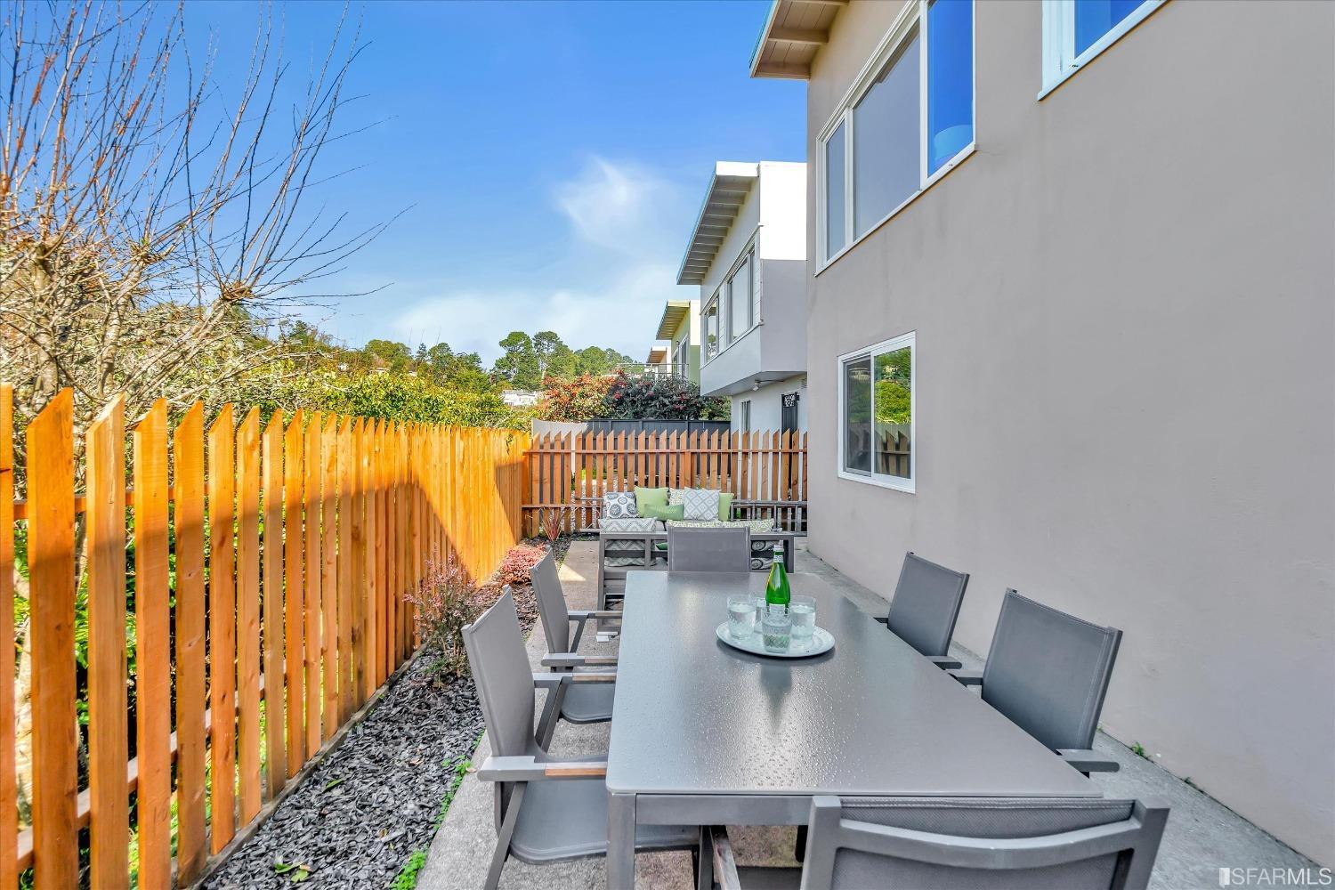159 Skyview Way San Francisco, CA 94131 - Photo 16 of 17 a view of a dining room with furniture and a chandelier