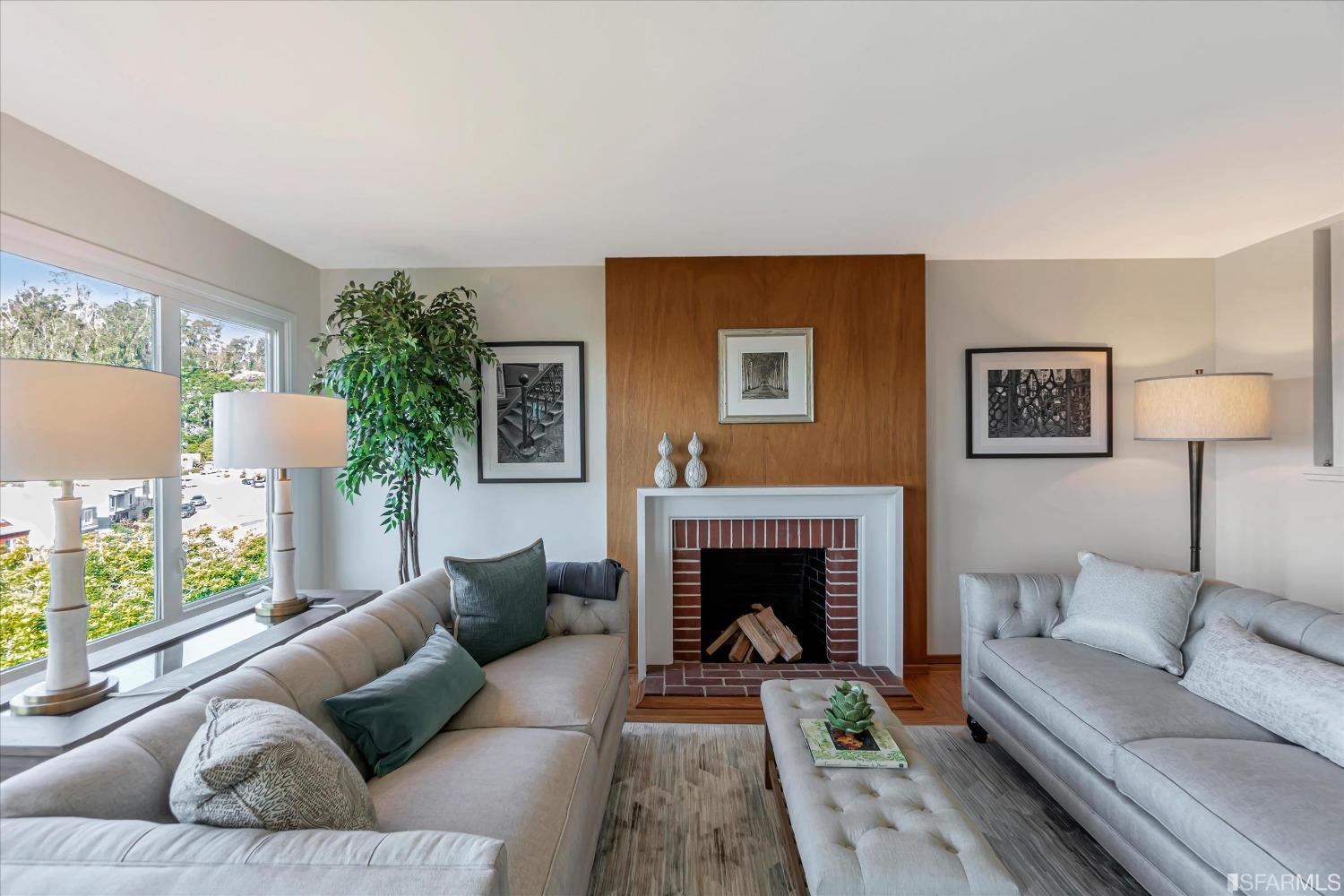 159 Skyview Way San Francisco, CA 94131 - Photo 4 of 17 a living room with furniture and a fireplace