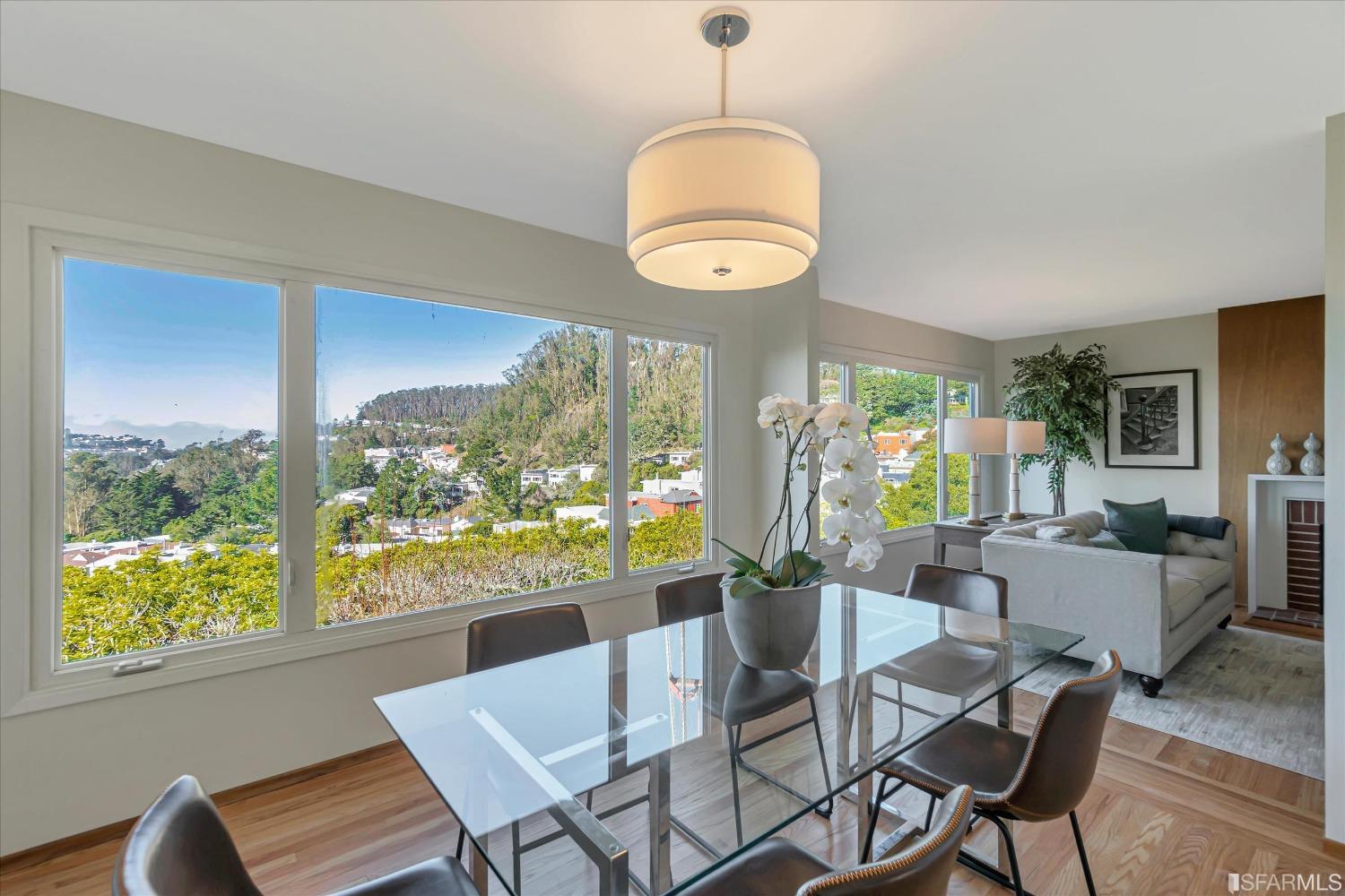 159 Skyview Way San Francisco, CA 94131 - Photo 5 of 17 a view of a dining room with furniture window and wooden floor