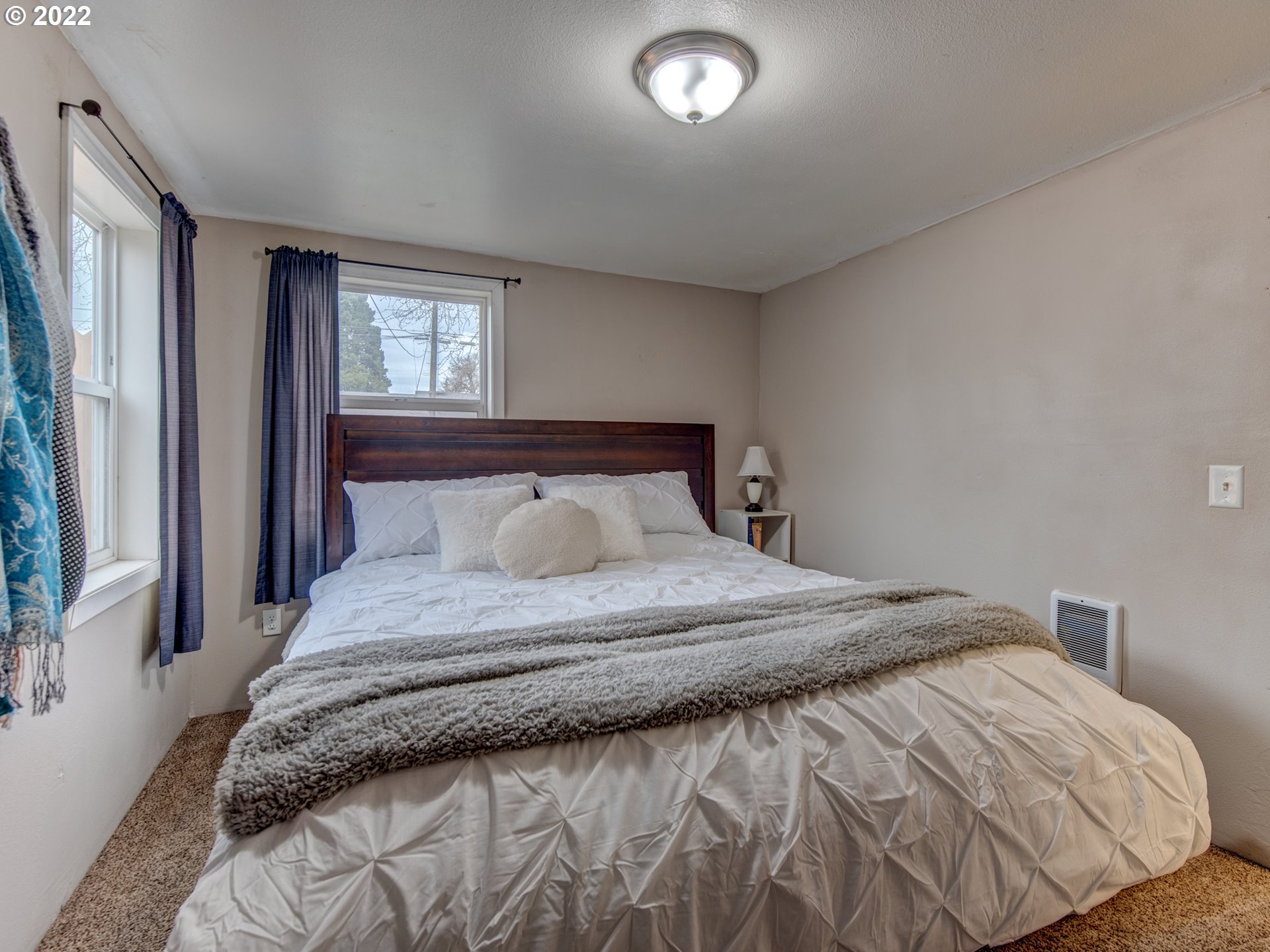 1177 N Street Springfield, OR 97477 - Photo 14 of 30 a bedroom with a bed and window