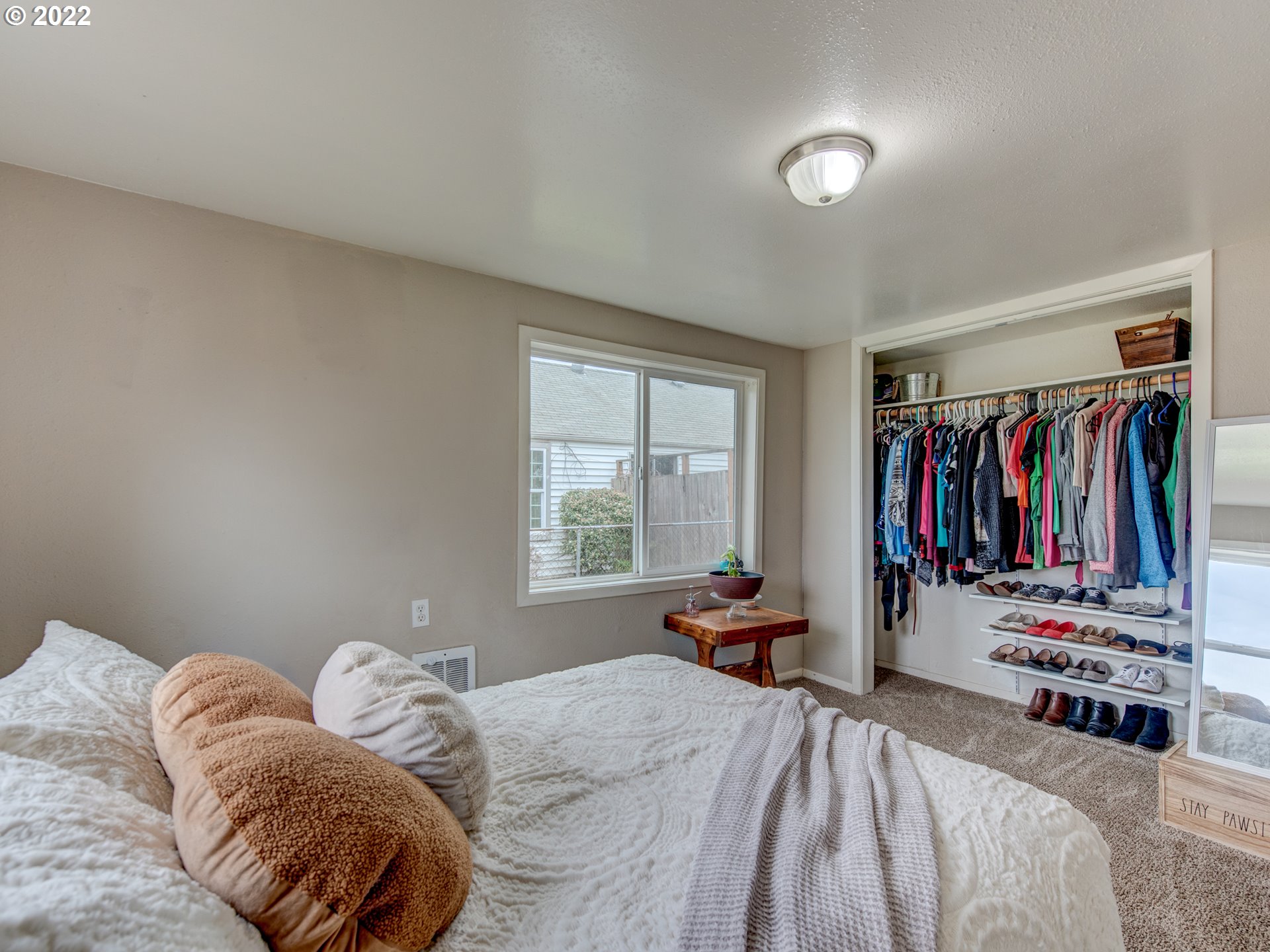 1177 N Street Springfield, OR 97477 - Photo 17 of 30 a bedroom with a bed and a window
