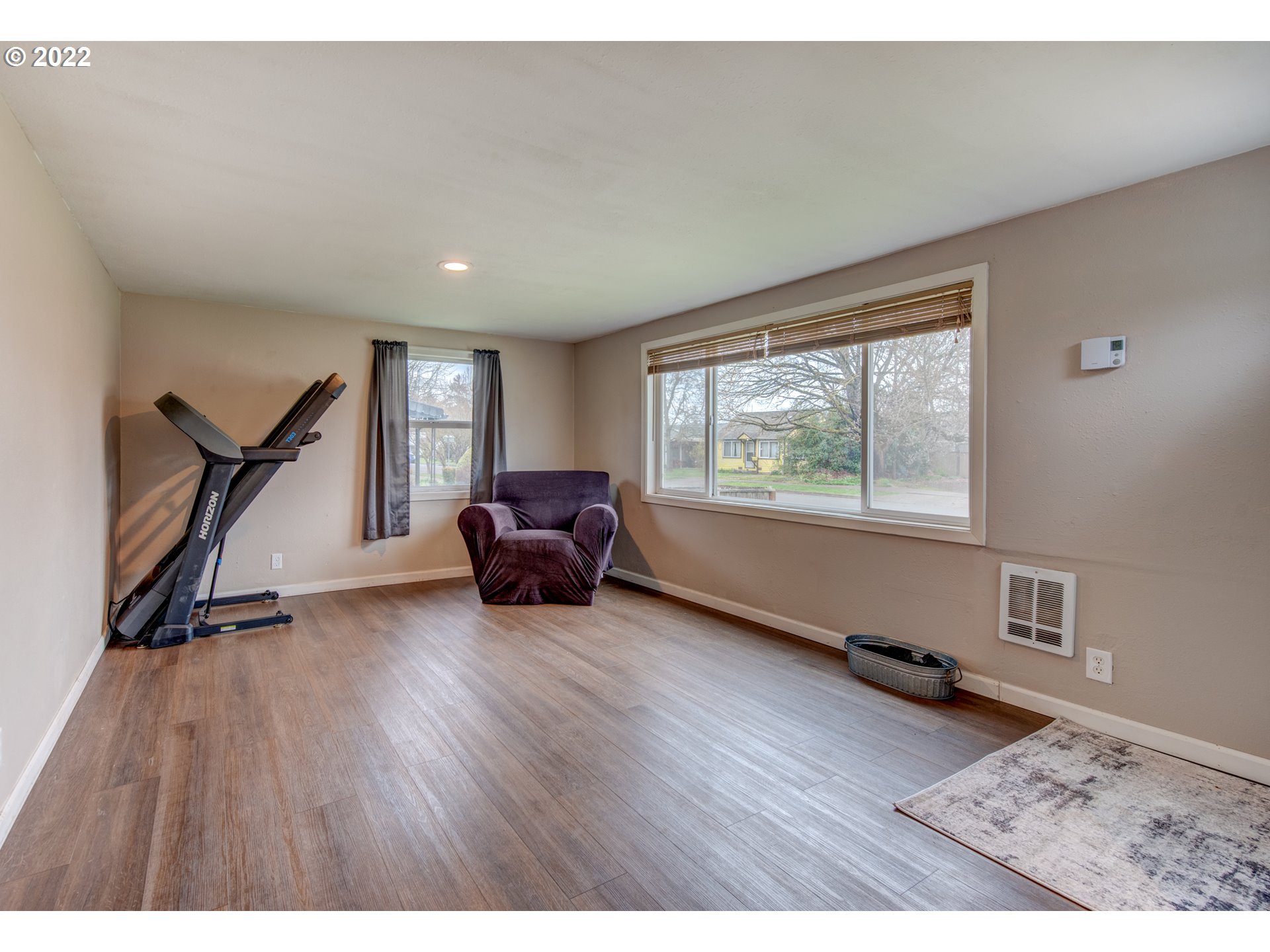 1177 N Street Springfield, OR 97477 - Photo 21 of 30 a living room with furniture and a wooden floor