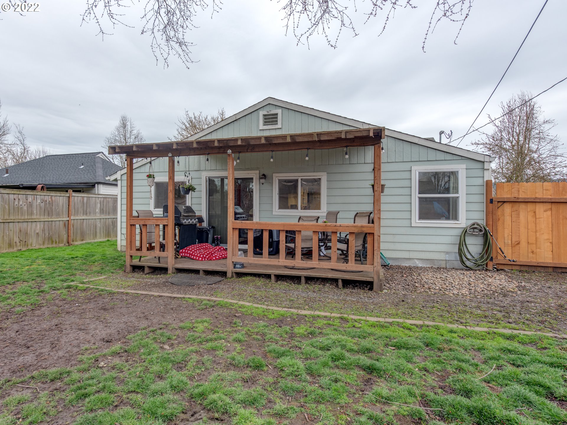 1177 N Street Springfield, OR 97477 - Photo 25 of 30 a view of a house with a yard and sitting area