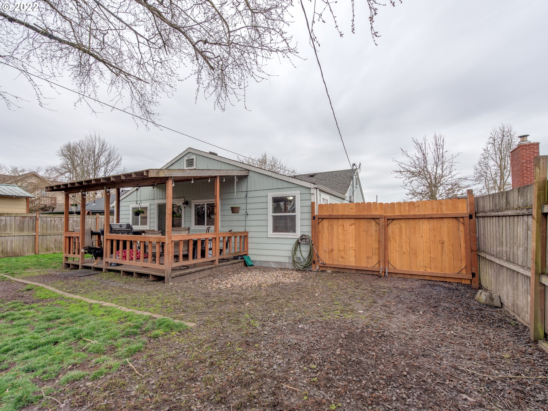 1177 N Street Springfield, OR 97477 - Photo 26 of 30 a view of a house with a yard and sitting area
