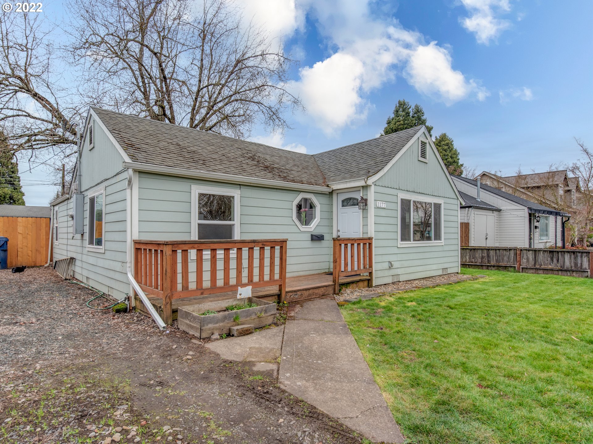 1177 N Street Springfield, OR 97477 - Photo 3 of 30 a front view of a house with a yard