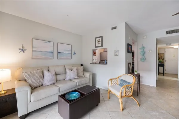 a living room with furniture and a couch