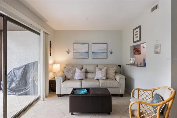 a living room with furniture and a couch