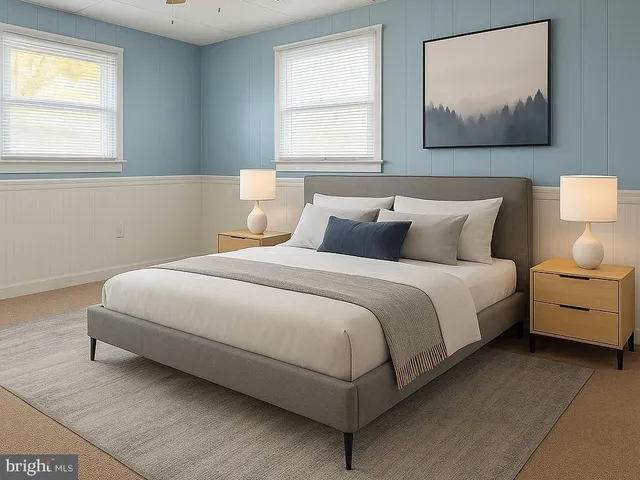 a bedroom with bed and window