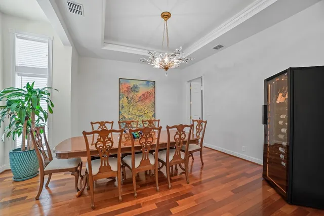 a living room with furniture a table and a fireplace