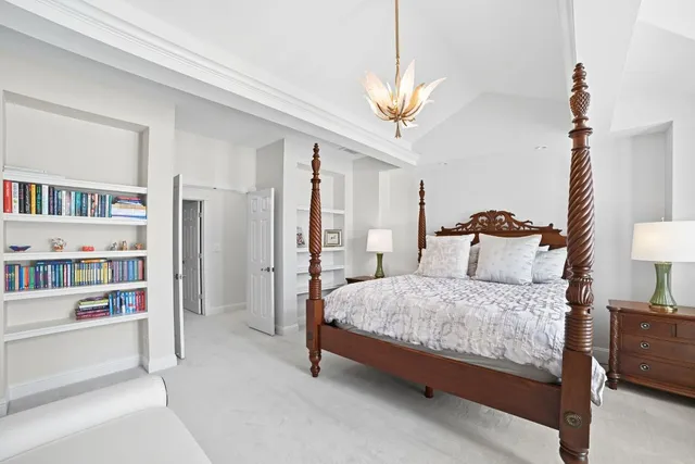 a spacious bathroom with a double vanity sink and a mirror