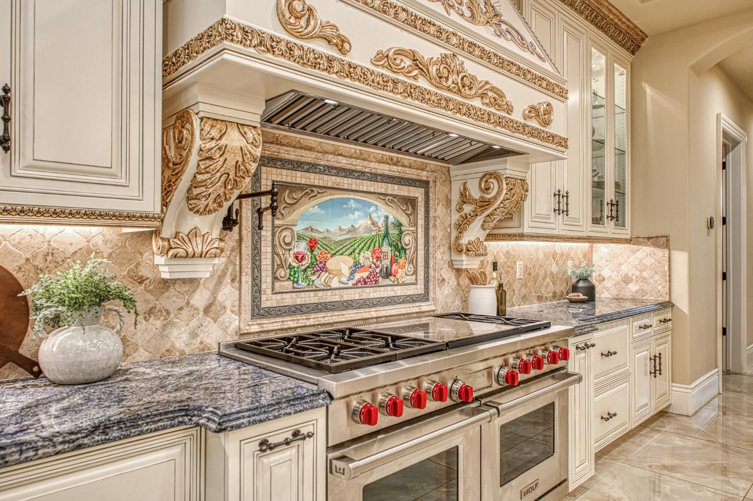 6060 North Van Ness Boulevard Fresno, CA 93711 - Photo 14 of 26 a kitchen with a stove and a white cabinet