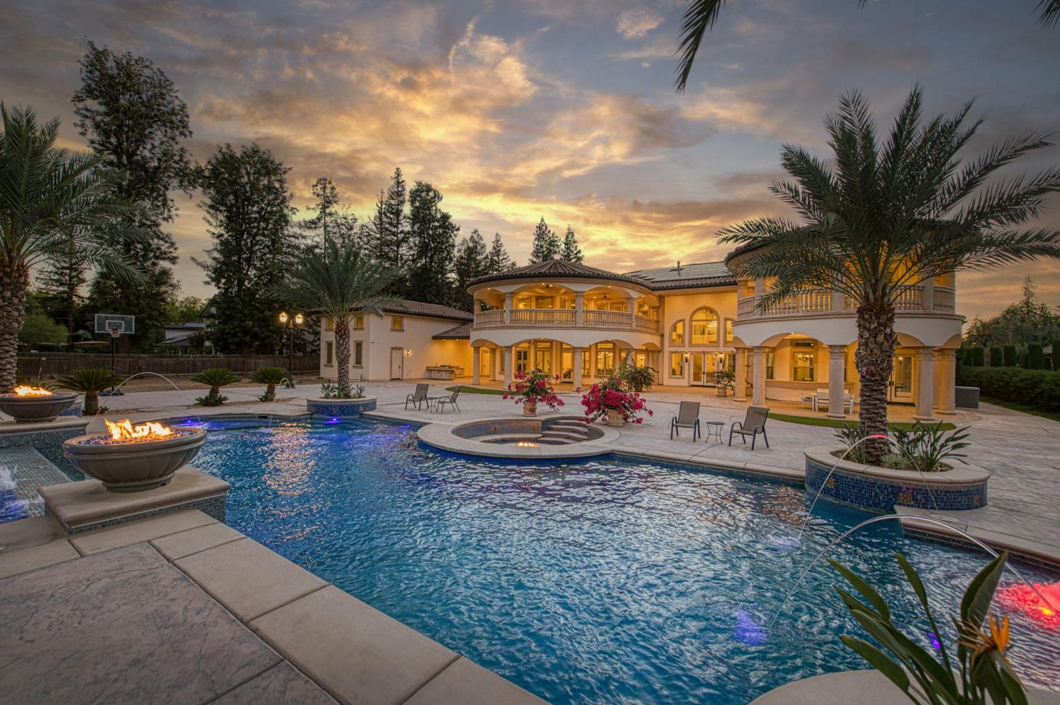 6060 North Van Ness Boulevard Fresno, CA 93711 - Photo 22 of 26 a view of a backyard with swimming pool