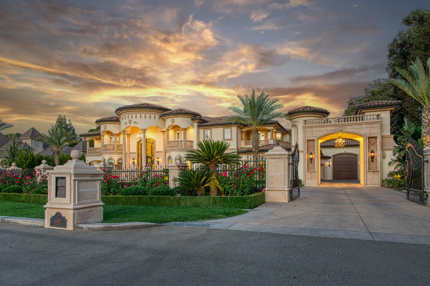 6060 North Van Ness Boulevard Fresno, CA 93711 - Photo 5 of 26 a front view of a house with a yard