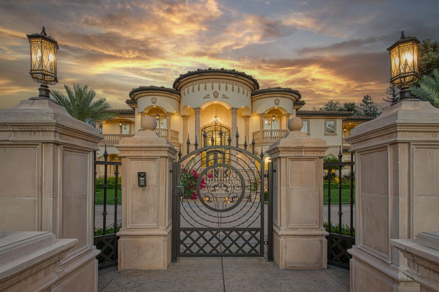 6060 North Van Ness Boulevard Fresno, CA 93711 - Photo 6 of 26 a view of a brick house with a iron gate