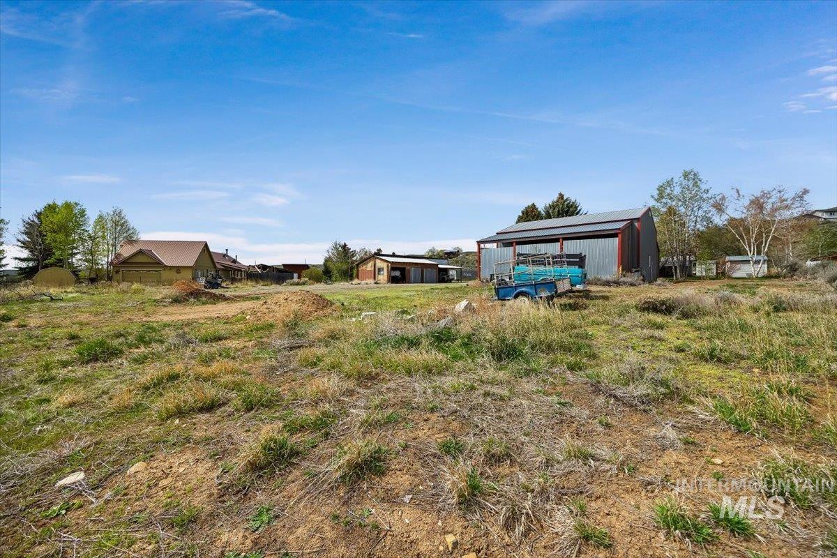 102 Willow Creek Road Fairfield, ID 83327 - Photo 28 of 32 View of yard with an outbuilding