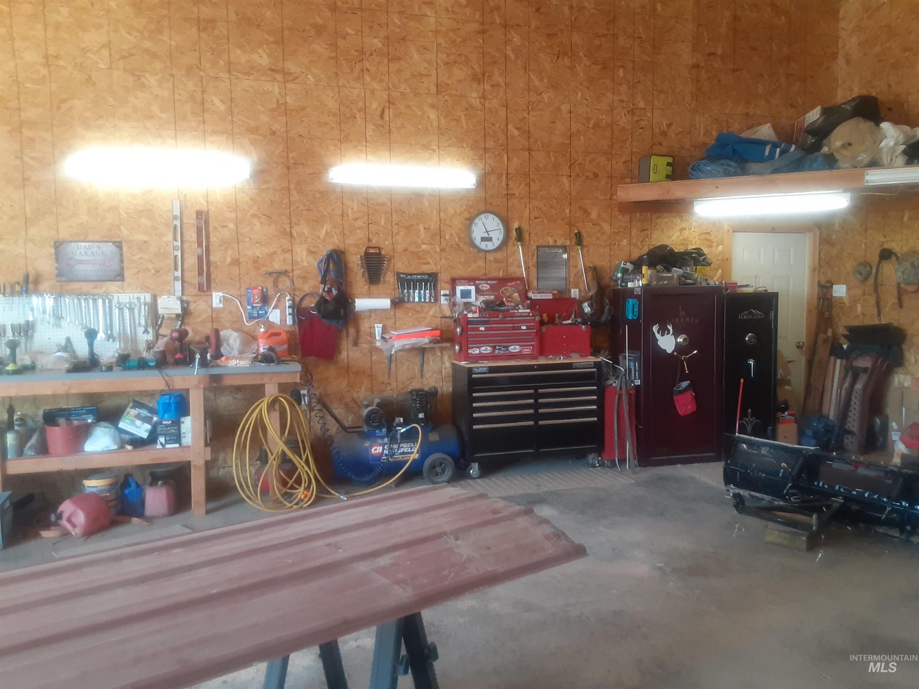 102 Willow Creek Road Fairfield, ID 83327 - Photo 32 of 32 Garage featuring a workshop area