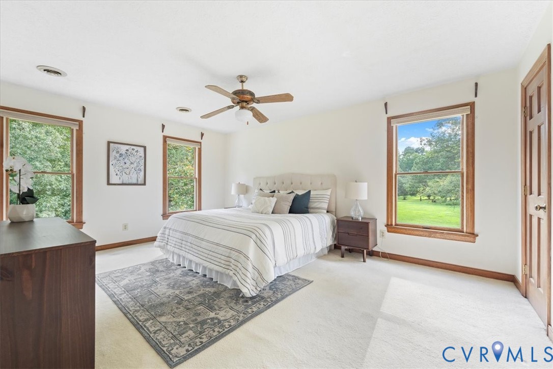 5170 Hurop Road Sandston, VA 23150 - Photo 16 of 20 Great primary bedroom with ceiling fan and walk-in