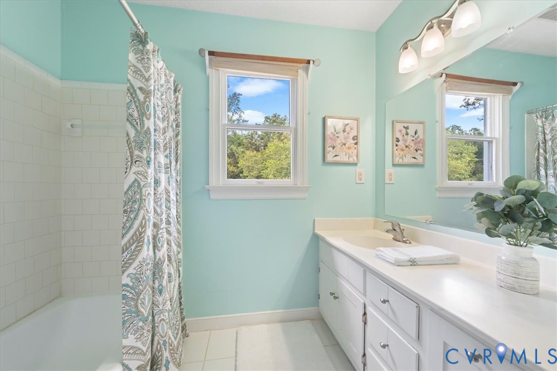 5170 Hurop Road Sandston, VA 23150 - Photo 18 of 20 Updated main bath with tile floor and tile tub/sho
