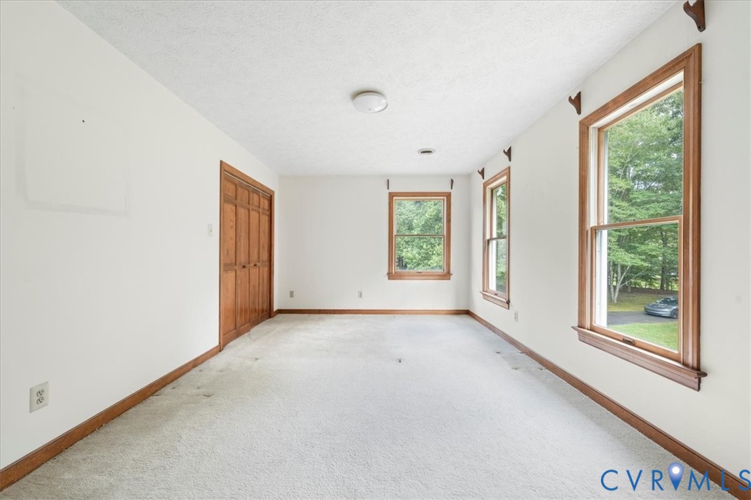 5170 Hurop Road Sandston, VA 23150 - Photo 20 of 20 Front Bedroom with 3 windows and two closets!