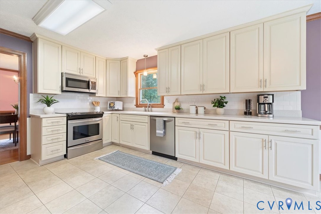 5170 Hurop Road Sandston, VA 23150 - Photo 9 of 20 Beautiful updated cabinets and corian counters.