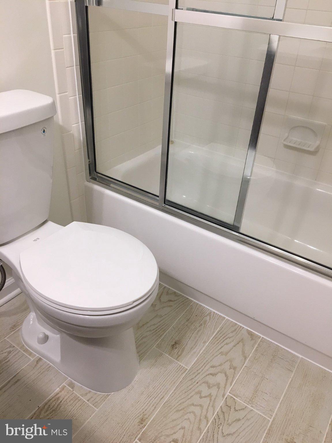 11951 Heathcote Court Reston, VA 20191 - Photo 12 of 14 Modern bathroom with sleek finishes.