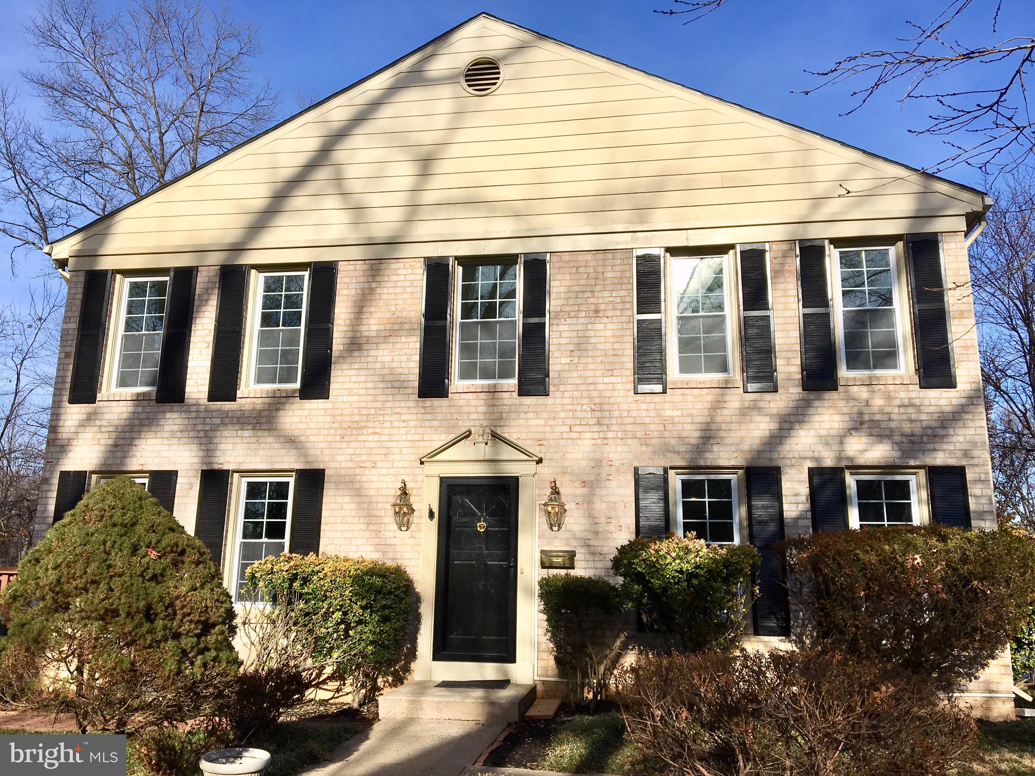 11951 Heathcote Court Reston, VA 20191 - Photo 2 of 14 Charming brick facade with classic shutters.