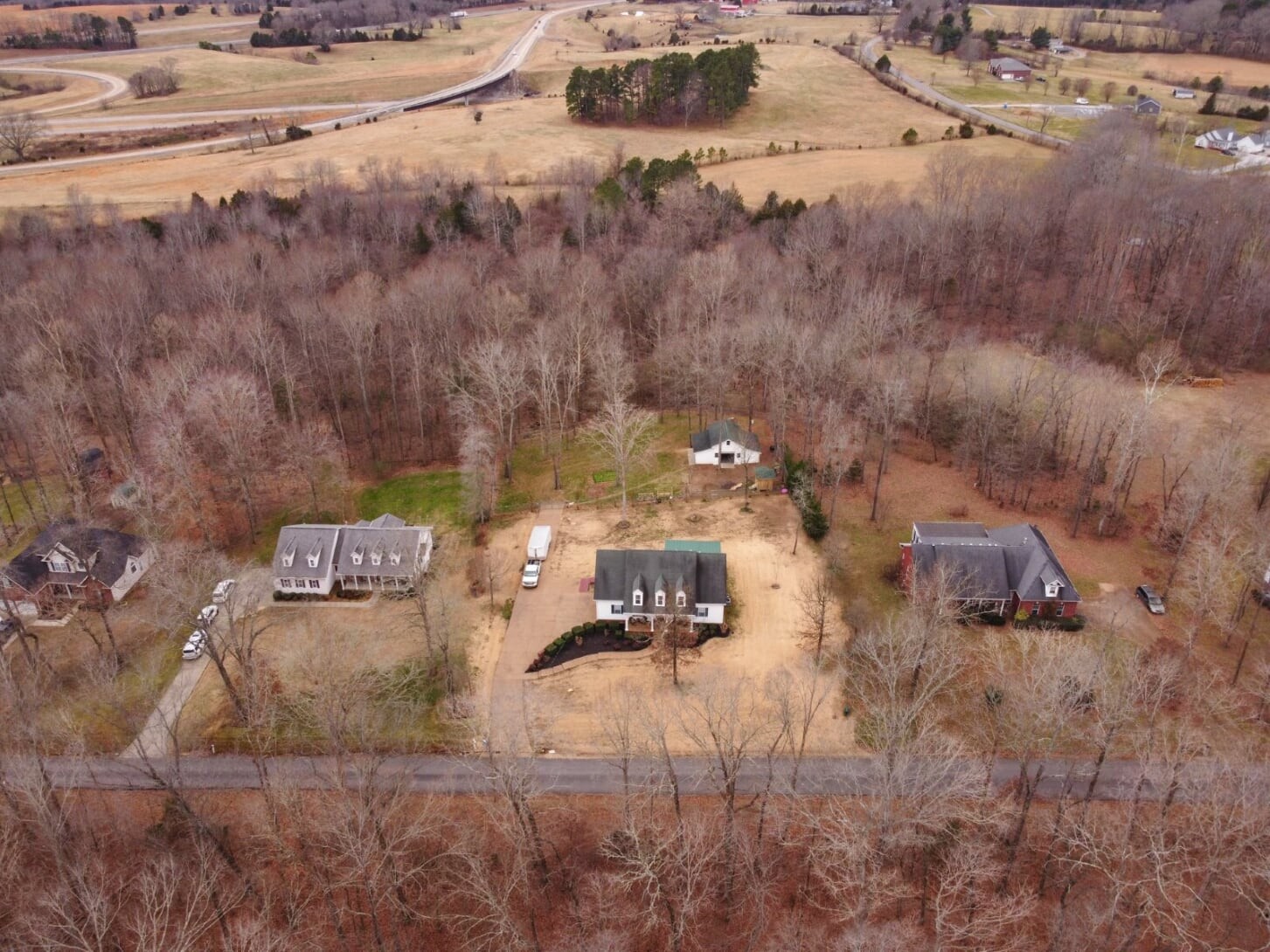 1014 Meeks Cemetery Road Burns, TN 37029 - Photo 33 of 33 an aerial view of residential houses with outdoor space