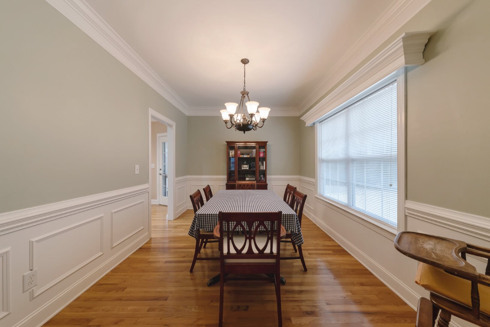1014 Meeks Cemetery Road Burns, TN 37029 - Photo 6 of 33 a view of a dining room with furniture and wooden floor