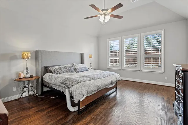 a living room with a bed furniture and a window
