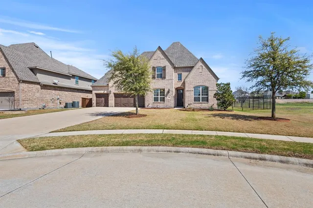 a house with trees in front of it