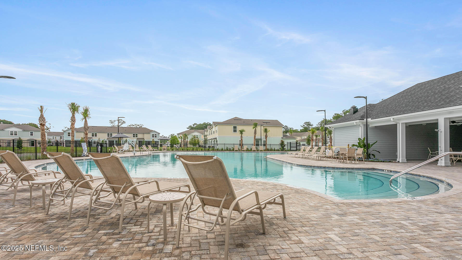 42 Blue Hvn Road St. Augustine, FL 32095 - Photo 19 of 45 a view of a swimming pool with outdoor seating space