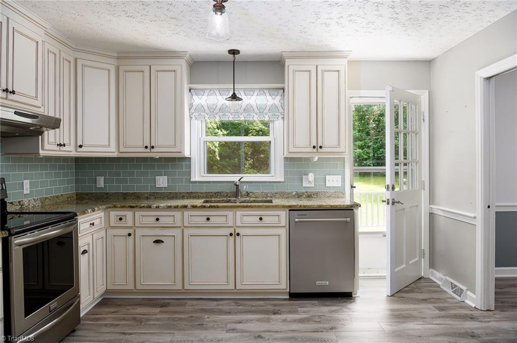 692 Beauchamp Road Advance, NC 27006 - Photo 11 of 40 Gorgeous kitchen with SS appliances