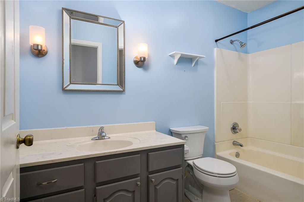 692 Beauchamp Road Advance, NC 27006 - Photo 14 of 40 Full bathroom in the hallway!