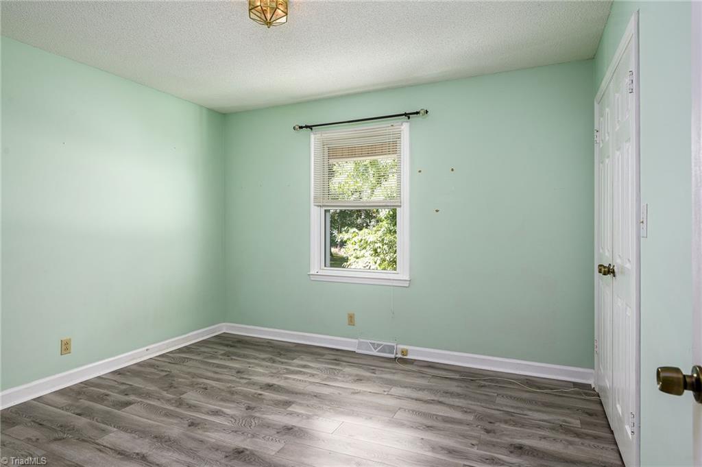 692 Beauchamp Road Advance, NC 27006 - Photo 17 of 40 Large second bedroom!