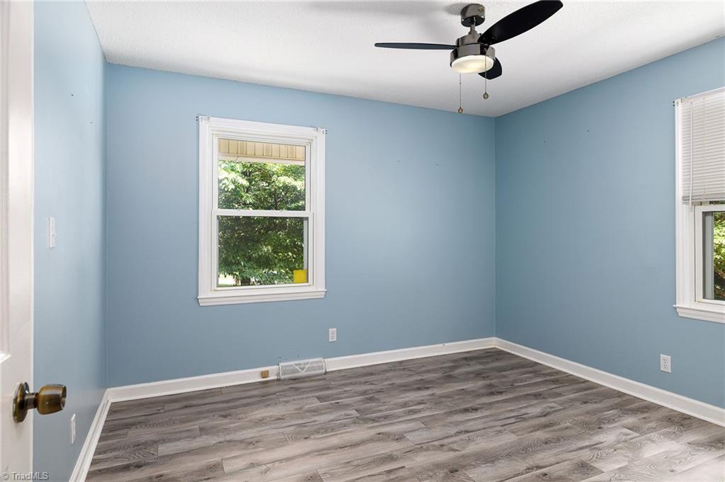 692 Beauchamp Road Advance, NC 27006 - Photo 19 of 40 Third bedroom with lots of natural light!