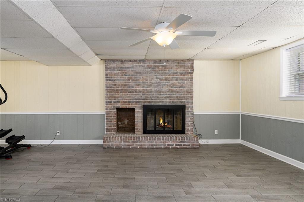 692 Beauchamp Road Advance, NC 27006 - Photo 21 of 40 Beautiful fireplace in the downstairs rec room!
