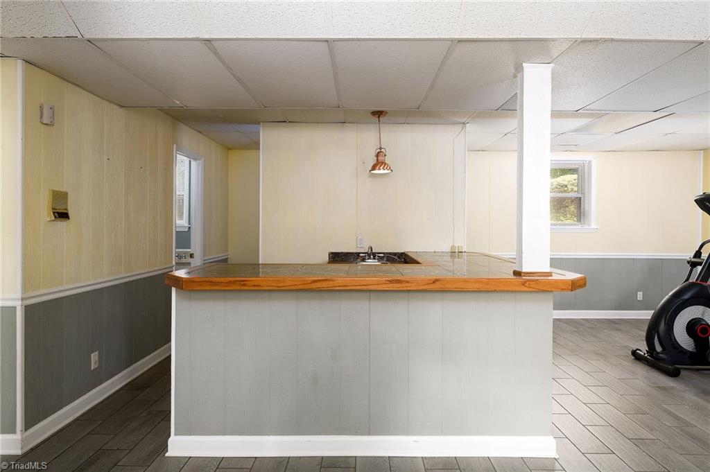 692 Beauchamp Road Advance, NC 27006 - Photo 24 of 40 Wet bar in the downstairs area!